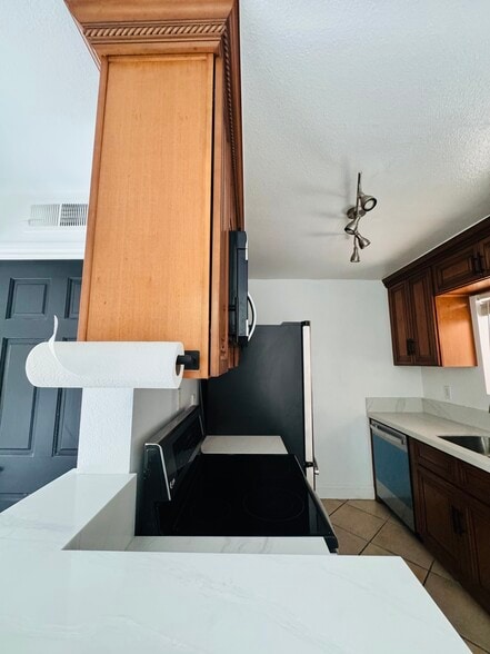 View of Kitchen from Dining Room Area - 2507 E 15th St