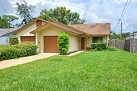 Building Photo - Two Bedroom, Two Bath, One Car Garage Duplex