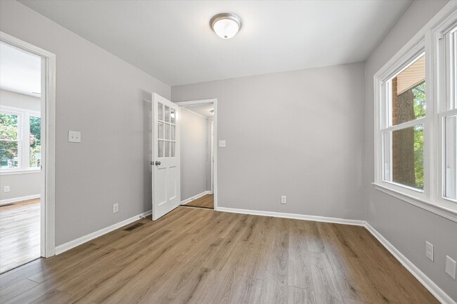 Building Photo - Renovated Brick Ranch with Nature Views + Close to Everything Fort Mill Offers 3 Bedrooms | 1 Bat...