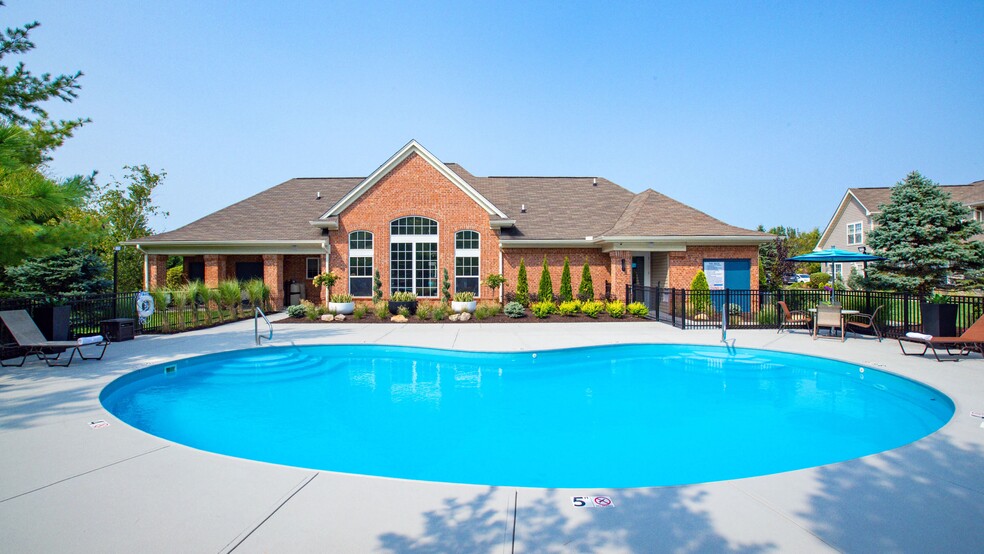 Submerge yourself in our inviting resort-style swimming pool. - The Reserve at Monroe Crossings