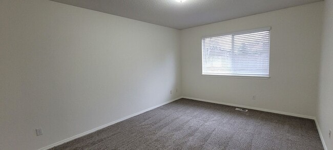 Building Photo - CDA Place Neighborhood- 4 bed with basement, cul de sac