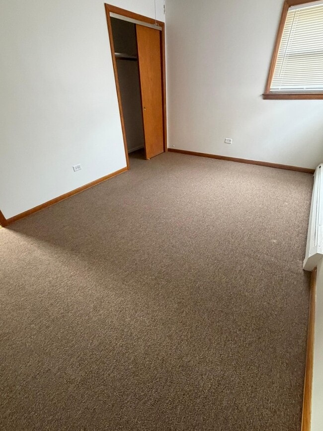 Building Photo - 7612 W Belmont Ave