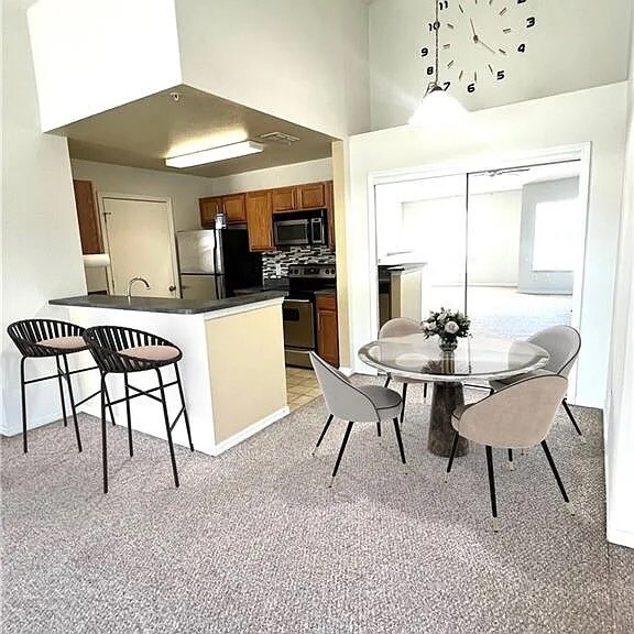 Virtually Staged Kitchen and Dining Areas - 14870 Pleasant Bay Ln