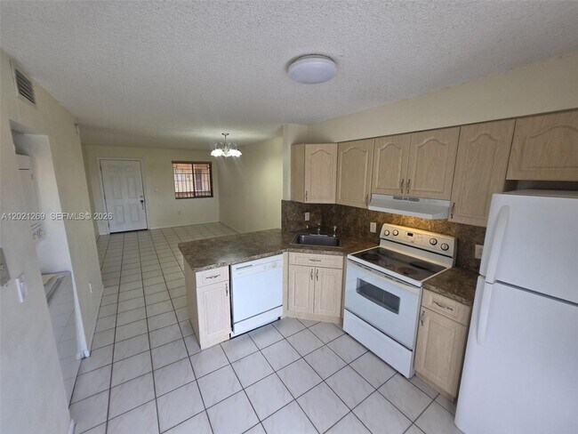 Building Photo - 5560 W 21st Ct