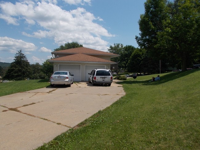 end view with 2nd garage & driveway - 105 Hill St