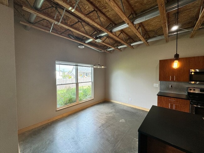 Building Photo - Stunning Modern Urban Loft – Spacious, Sty...