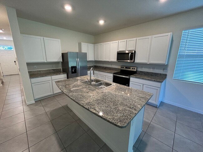 Building Photo - 8736 Milestone Dr