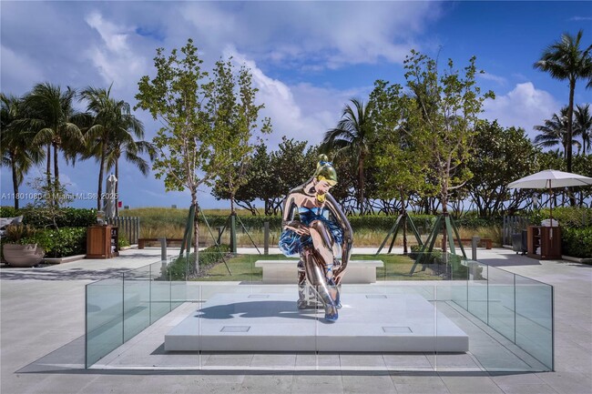 Building Photo - 10203 Collins Ave