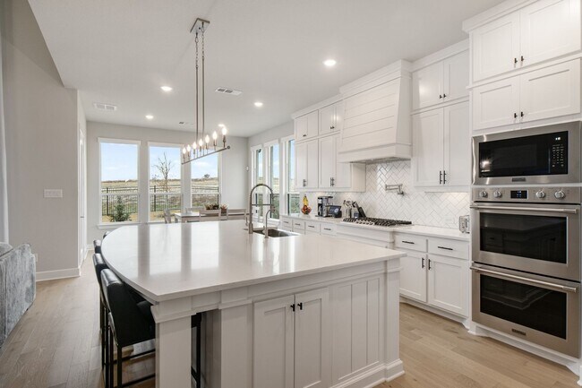 Building Photo - Stunning 4-Bedroom Luxury Residence with Bonus Office in the Prestigious Walsh Community LIKE NEW!