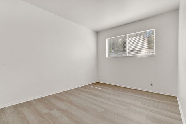 Building Photo - This is a large 2-bdr in a convenient, Freshly painted, updated kitchen counter tops and cabinets