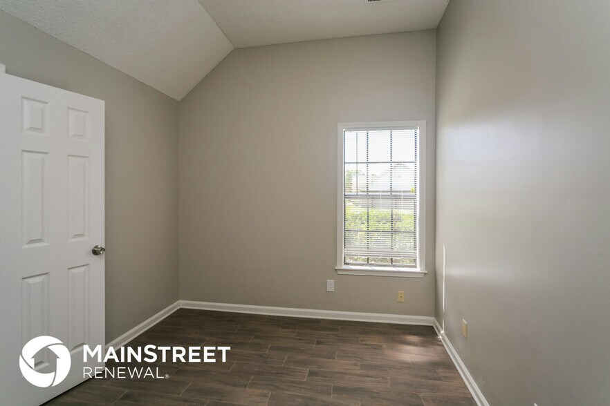 Building Photo - 6740 Stewart Forest Cove E