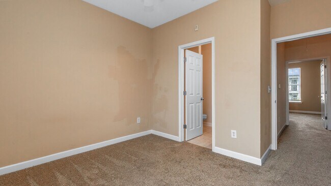 Building Photo - Located just Steps from Shopping, Dining, & Entertainment in The Market Common