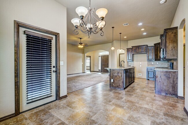 Building Photo - AVAILABLE THE END OF APRIL! 3 OR 4 BDRM, 2 BATHRM, 2 CAR & STORM SHELTER