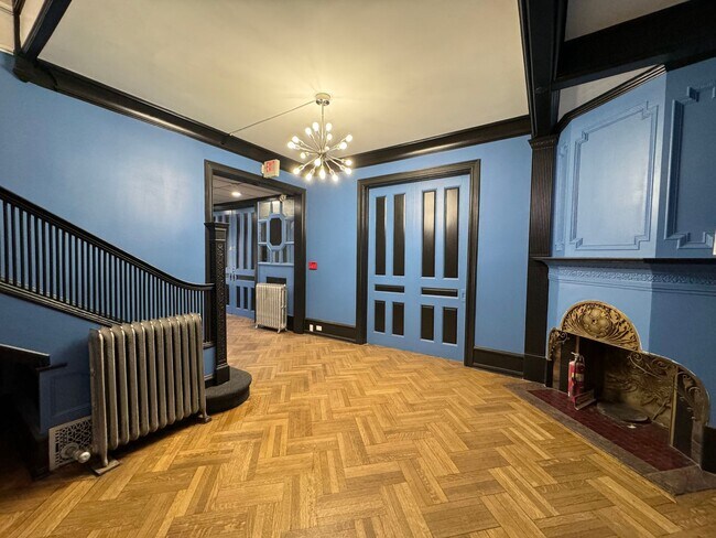 Building Photo - Stress-Free Stay: All-Inclusive Apartment Steps from Hospital