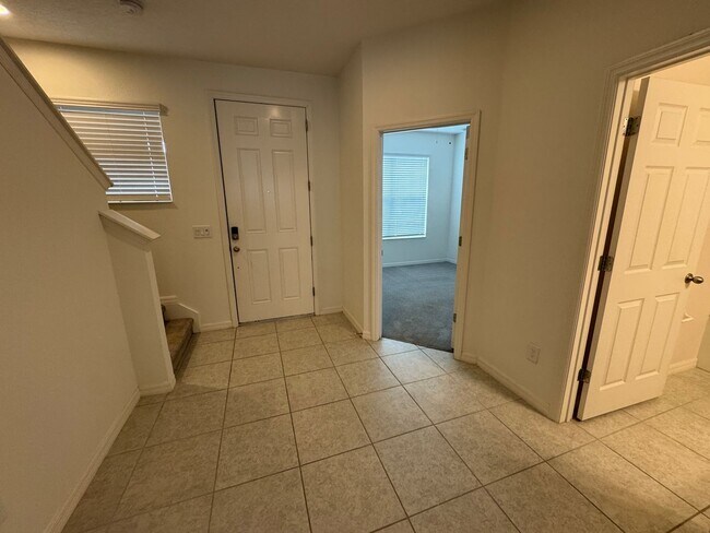 Building Photo - Available Now! Spacious 3-Bedroom Townhome with Fenced Yard in Winter Garden – Washer and Dryer I...