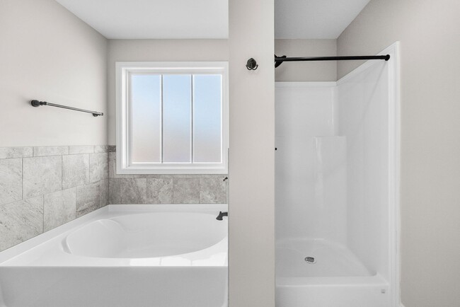 Building Photo - Pet Friendly Three Bedroom with Bonus!