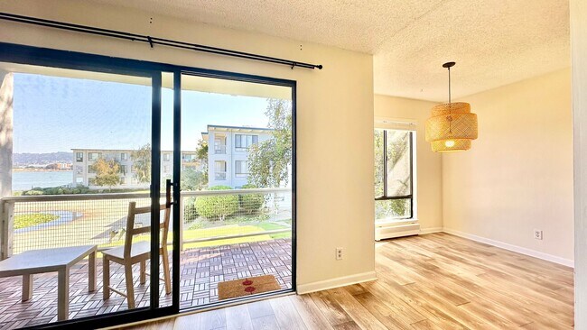 Building Photo - Lovely and Spacious Condo with a Water/Lagoon View and Resort Style Amenities!