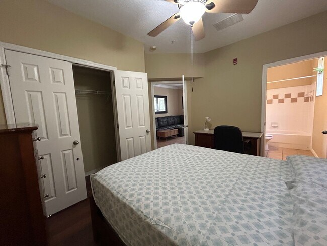 Building Photo - Walk to UF! Spacious & Furnished 3BD Condo...
