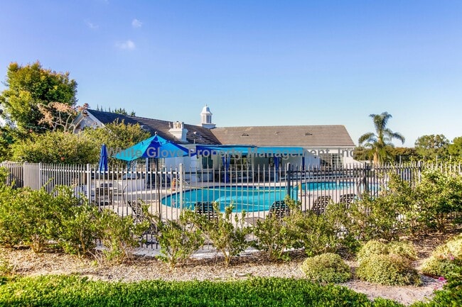 Building Photo - Updated Newport Beach Condo in Gated Versailles Community with Resort-Style Amenities