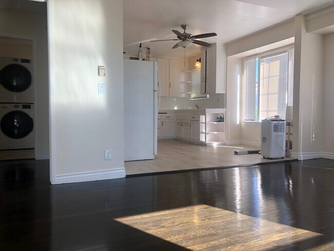 Living room to kitchen - 6117 S Fairfax Ave