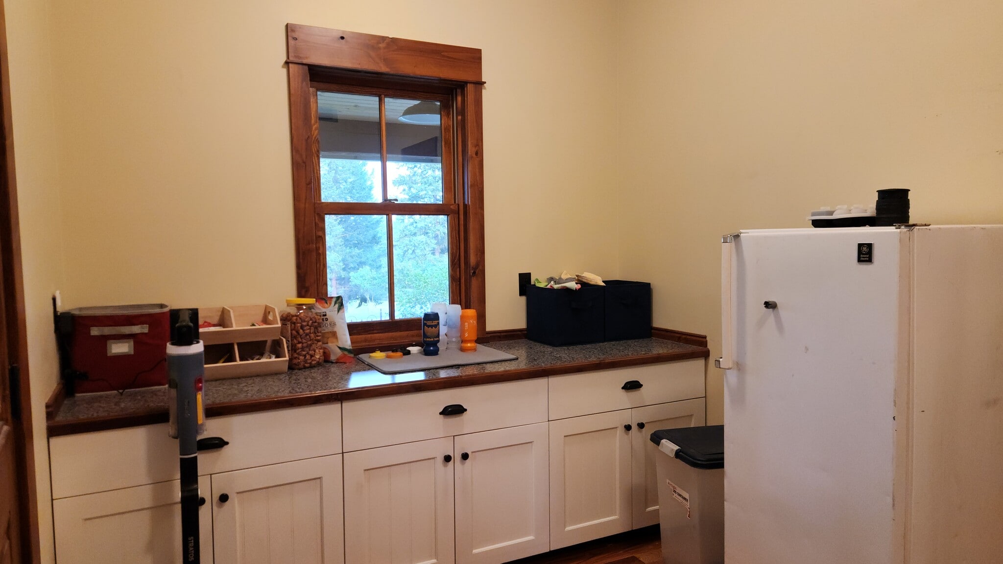 Laundry room with extra freezer - 6710 Farm To Market Rd