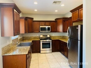 Building Photo - 6882 Majestic Palm Dr