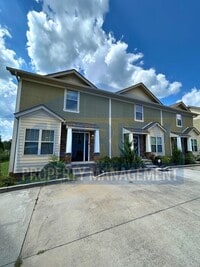 Building Photo - Modern townhome w/ master-on-main!