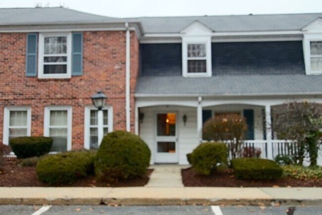Building Photo - Apply Today! 2 Bedroom - 1.5 Bath condo with garage - heat and hot water included