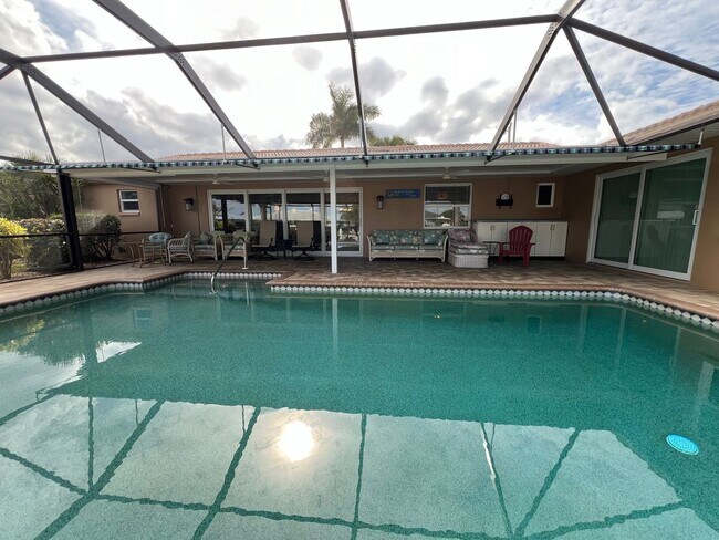 Building Photo - Furnished ** Punta Gorda Isles Vacation Home ** Heated Pool ** Canal / Boat Dock ** $7,500