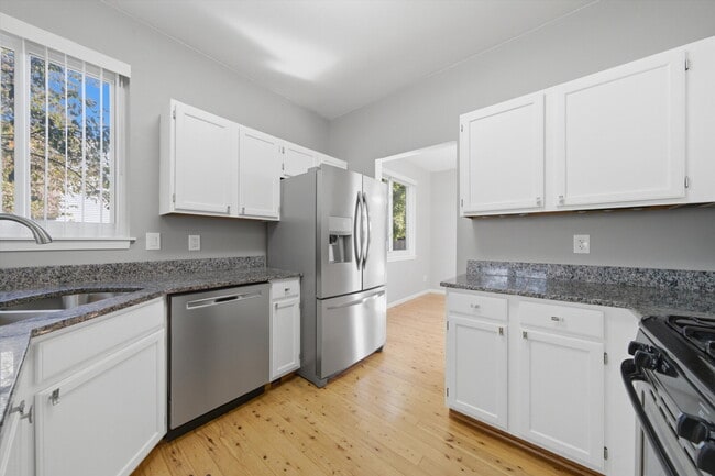 Building Photo - Updated Two-Story with Granite Kitchen, Deck, and Fully Fenced Yard