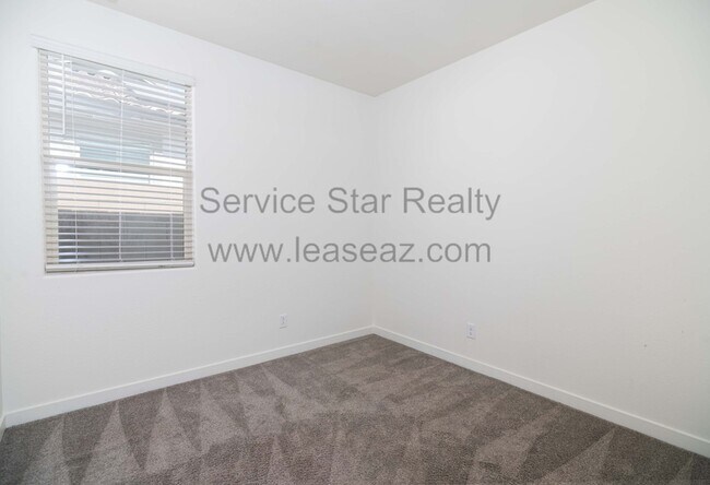 Building Photo - 9129 W Sells Dr