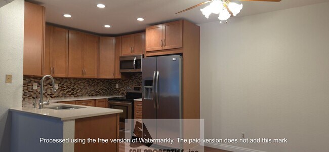 Building Photo - Beatiful Home in the Gated Sea Spray Community!