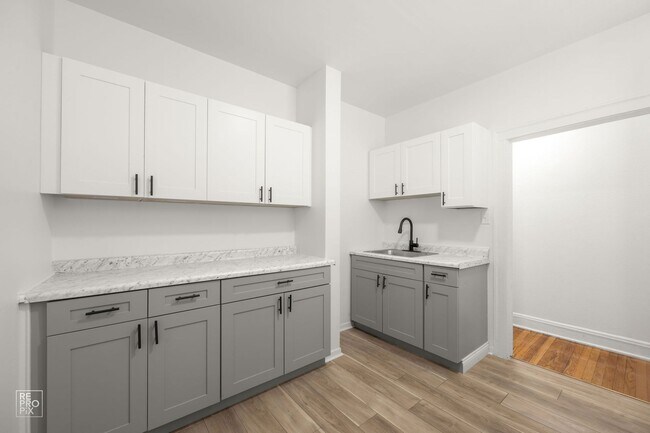 Building Photo - 7930-7946 S Ingleside Ave