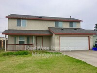 Building Photo - 730 NE Negus Pl