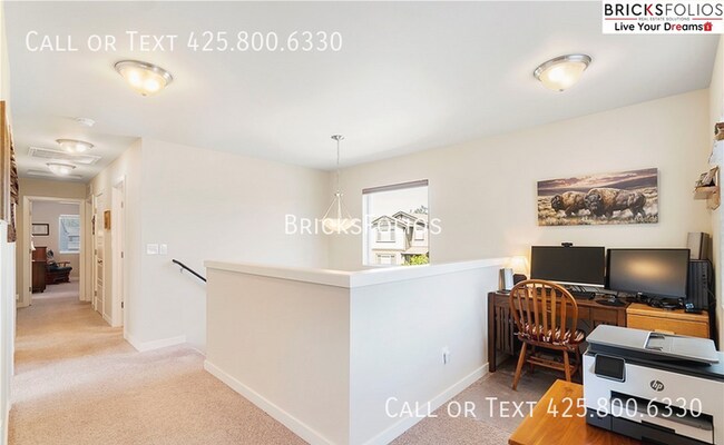 Building Photo - Elevate Your Lifestyle in the Heart of Puy...