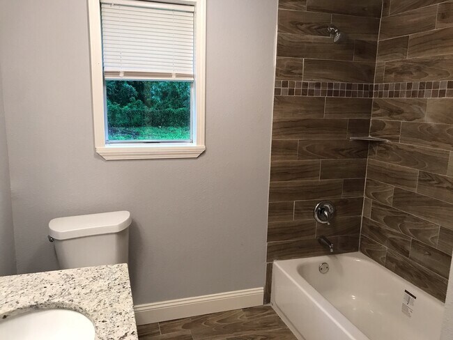 Building Photo - beautiful just remodeled home in Jones Creek. Move In Ready!