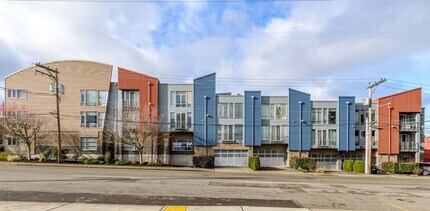 Building Photo - Industrial Townhouse featuring attached ga...
