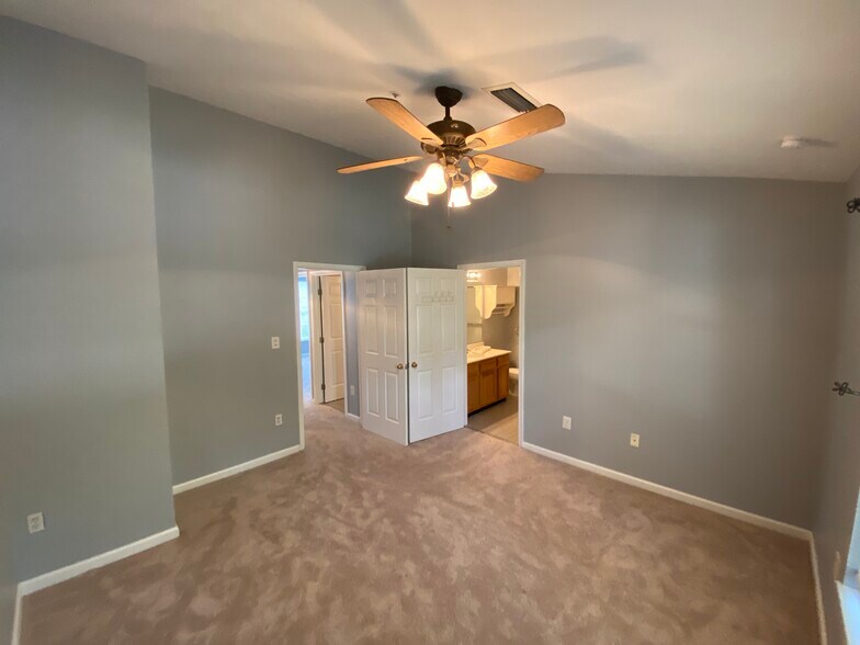 Main Bedroom (prior to new floors being installed) - 7812 Foxfarm Ln