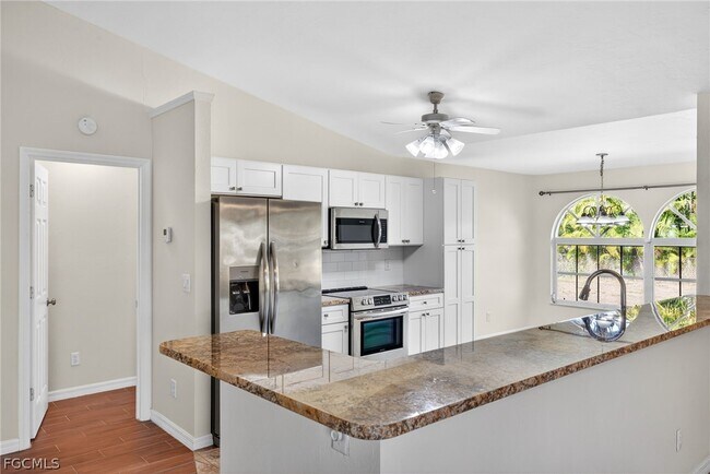 Building Photo - 5727 Rose Garden Rd