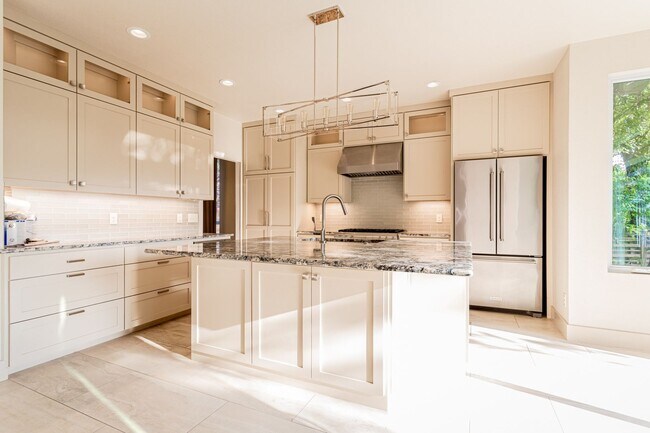 Building Photo - Gorgeous 4BR 2.5/BA Home with White Kitchen & Tree-Filled Yard