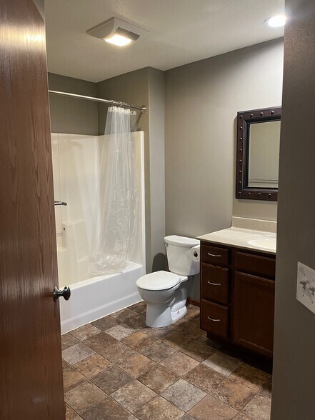 2 Full bathrooms and 1 half bathroom. - 1501 Grove Pl