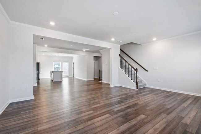 Building Photo - Bright, Spacious & Move-In Ready Townhome ...