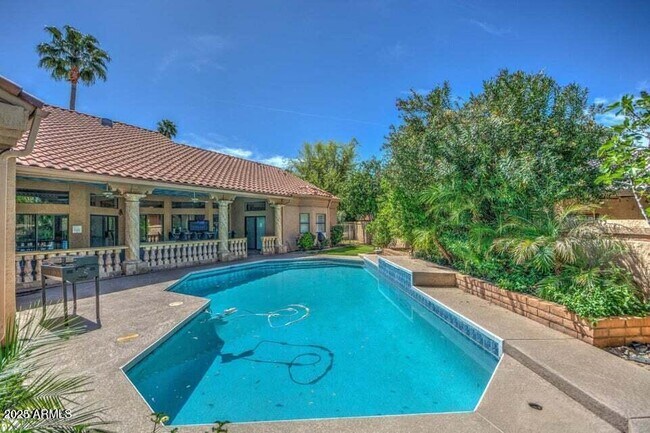 Building Photo - 1502 W Port Au Prince Ln