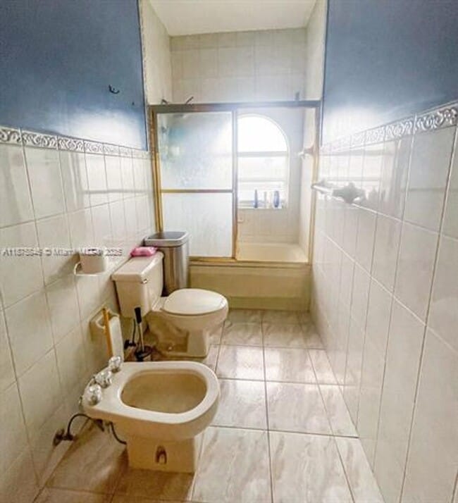 Building Photo - 9008 Collins Ave