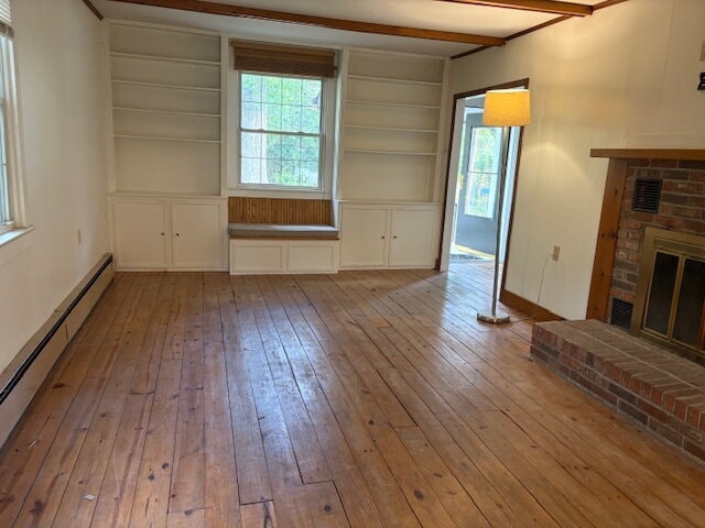 Building Photo - Hardwood floors and beautiful back yard in...