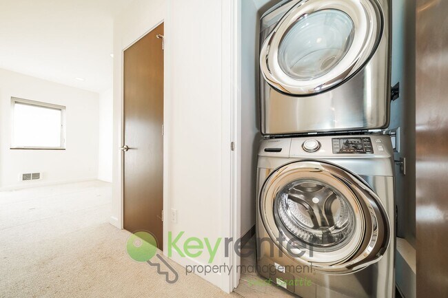 Building Photo - **Rent Special** Modern Two Bedroom Townhome with Designated Parking