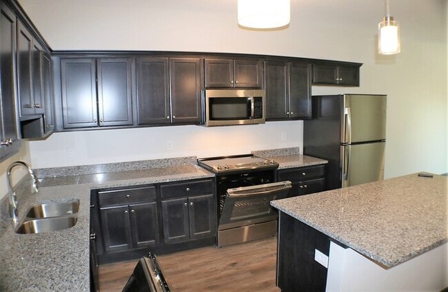 Building Photo - $1,285 | 1 Bedroom, 1 Bathroom Condo | ADA Compliant | No Pets | Available for Immediate Move In!