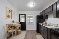 Building Photo - Secure this Beautiful 2BR Townhouse Now!