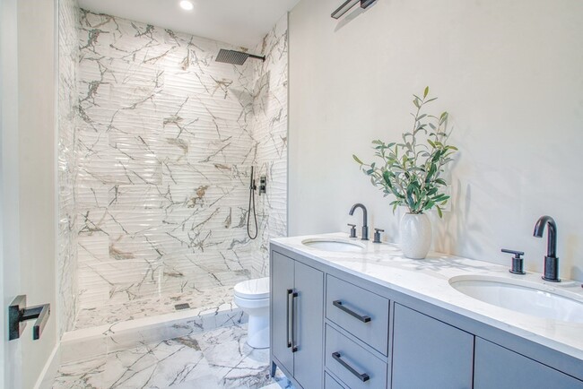 Master bathroom (shower doors and vanity mirrors have been added since photos were taken) - 116 Alexander St