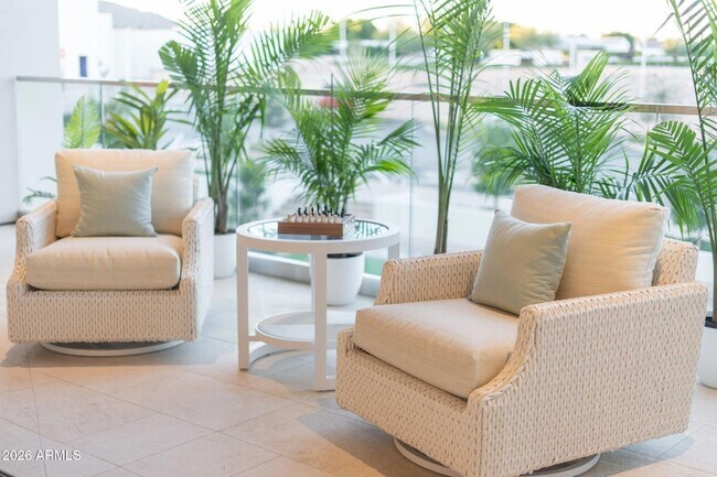 Building Photo - 6587 N Palmeraie Blvd